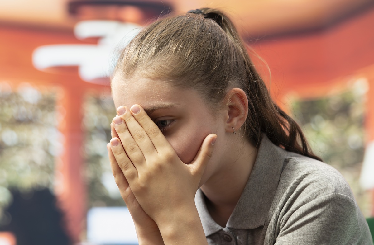 Fotografie nešťastné dívky, pláč